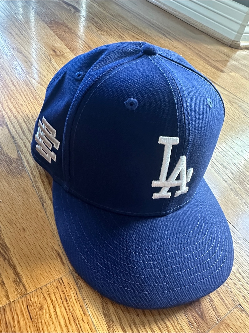 New Era 59FIFTY Fitted Hat in Navy with Green Undervisor